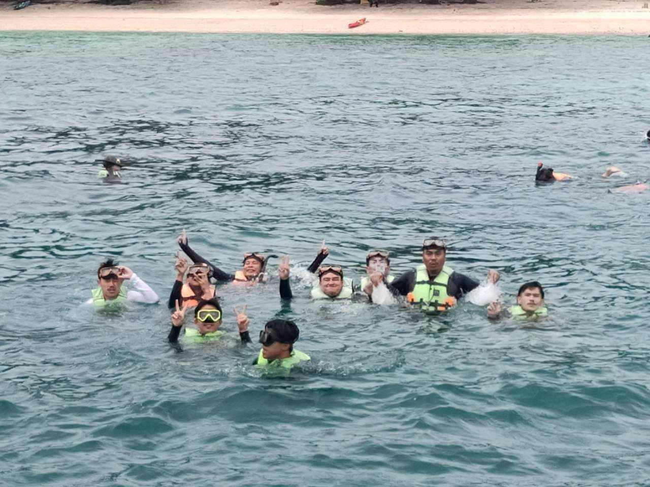 A snorkel group out at the reef