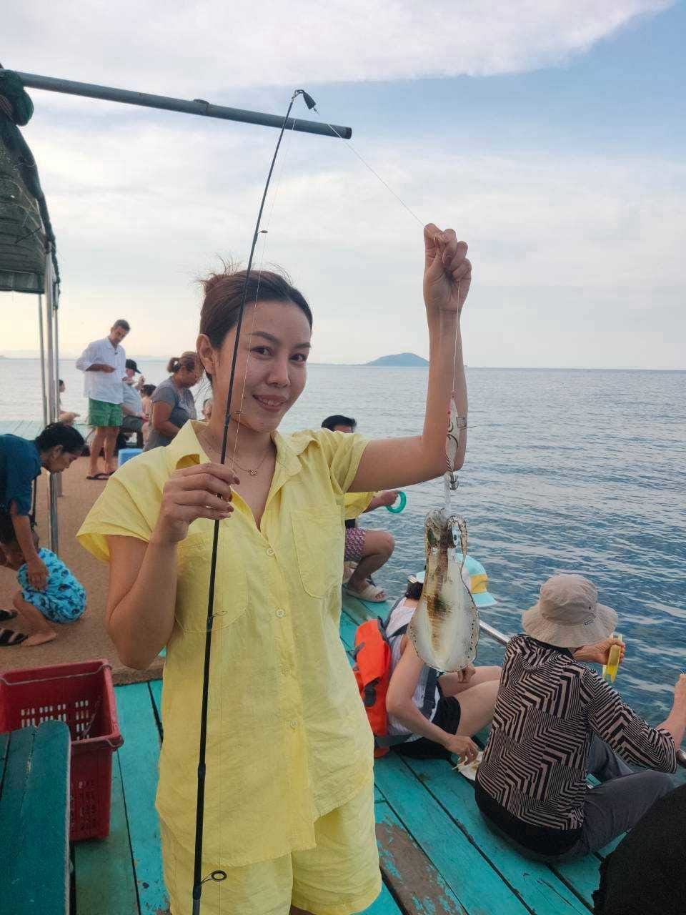 Squid fishing at sunset
